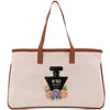 a bag with a bottle of perfume on it