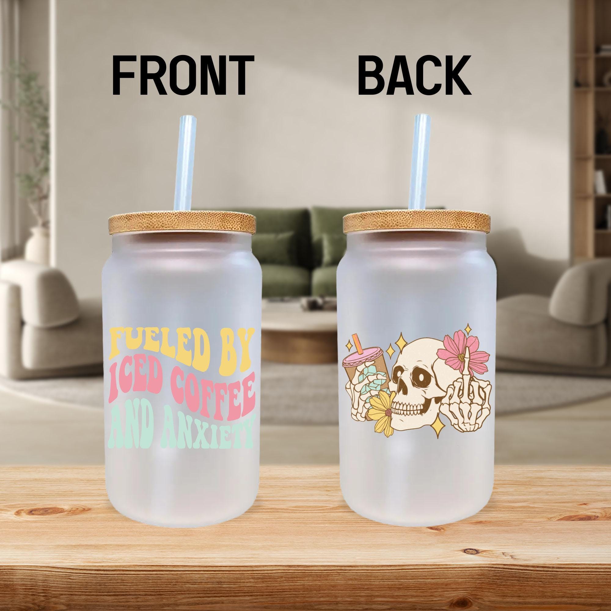 a couple of cups sitting on top of a wooden table