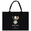 A black tote bag with a floral design and the text "Baking with Alice" printed on it.