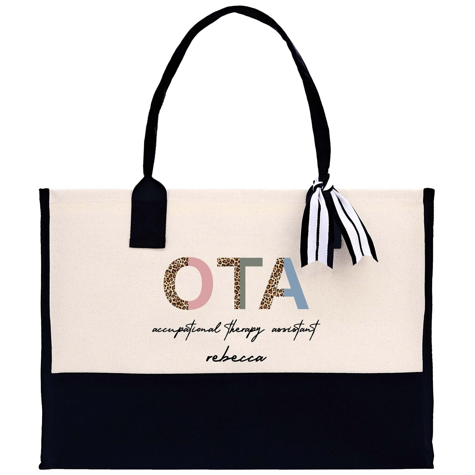 a white and black tote bag with a black handle