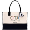 a white and black tote bag with a black handle