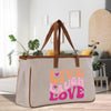 a canvas bag with the words live laugh love printed on it