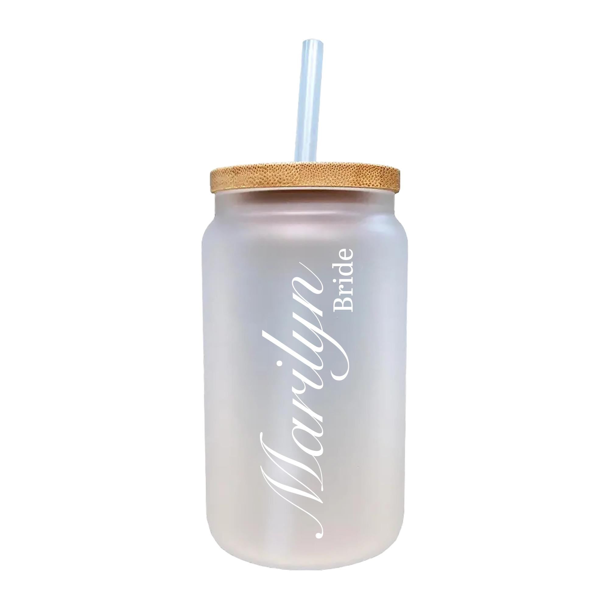 a white mason jar with a straw in it