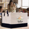 A large canvas tote bag with a cartoon animal design and the name "Nathan" printed on it, along with the date "08-21-2025".