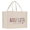 a white shopping bag with the word abuella charlotte printed on it