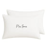 A pair of white rectangular pillows with the text "Mrs Jones" printed on them.
