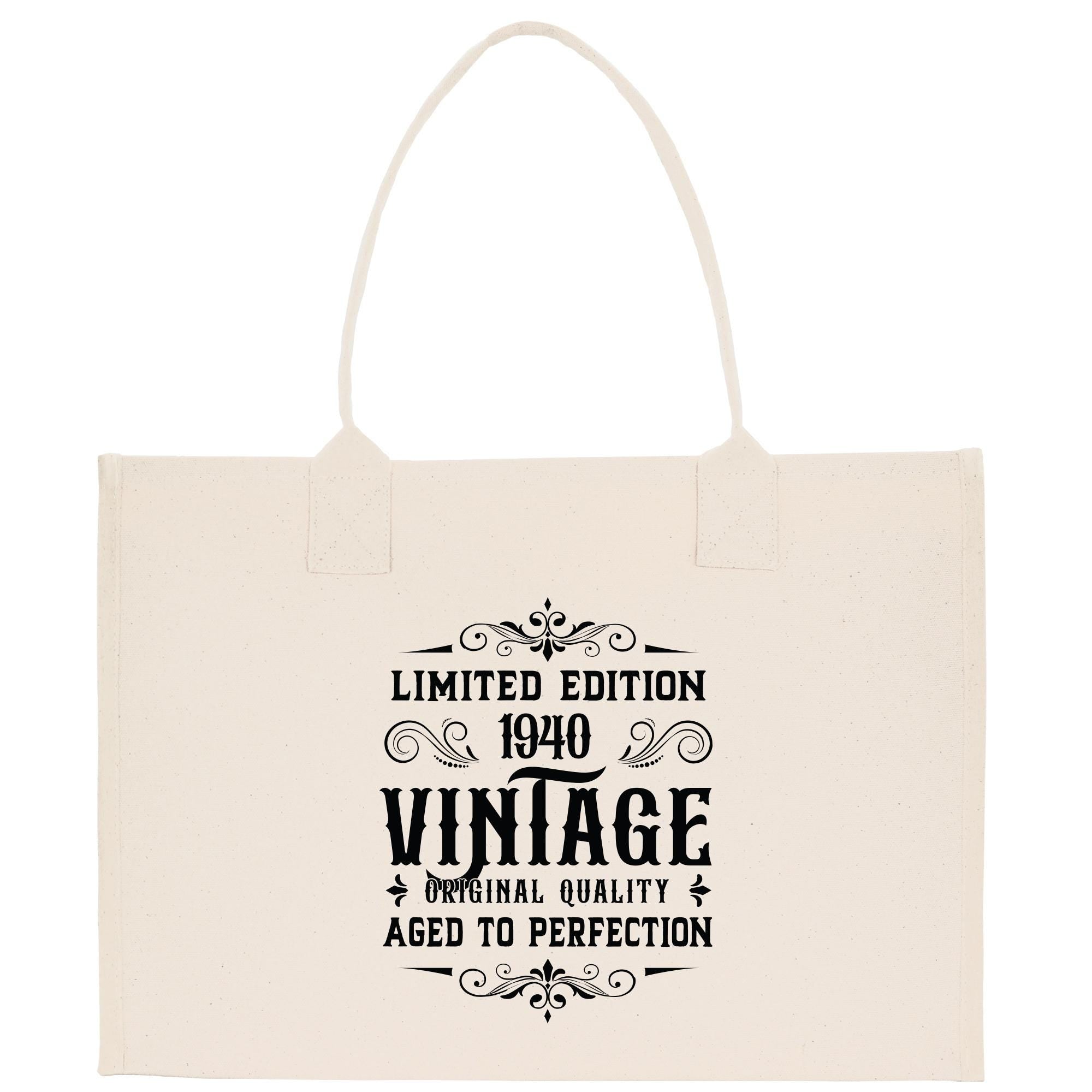 A beige canvas tote bag with a vintage-style design printed on it.