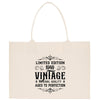 A beige canvas tote bag with a vintage-style design printed on it.