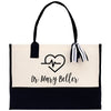 a black and white bag with a heart on it