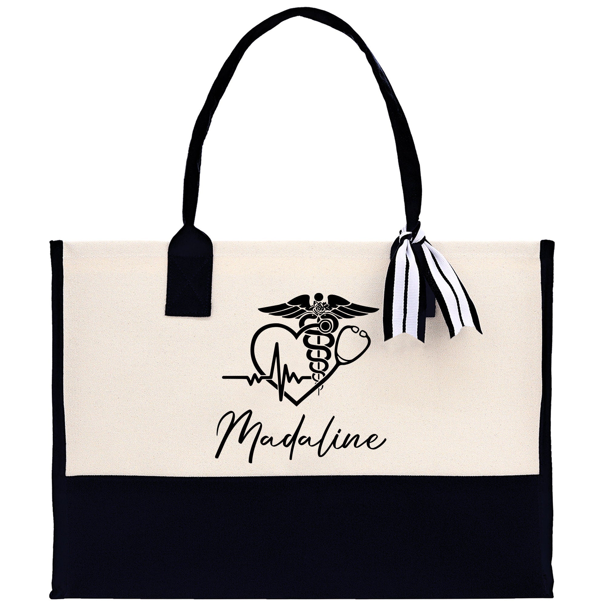 a black and white bag with a nurse&#39;s heart on it