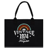 a black tote bag with the words vintage 1974 on it