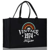 a black shopping bag with the words vintage 1974 on it
