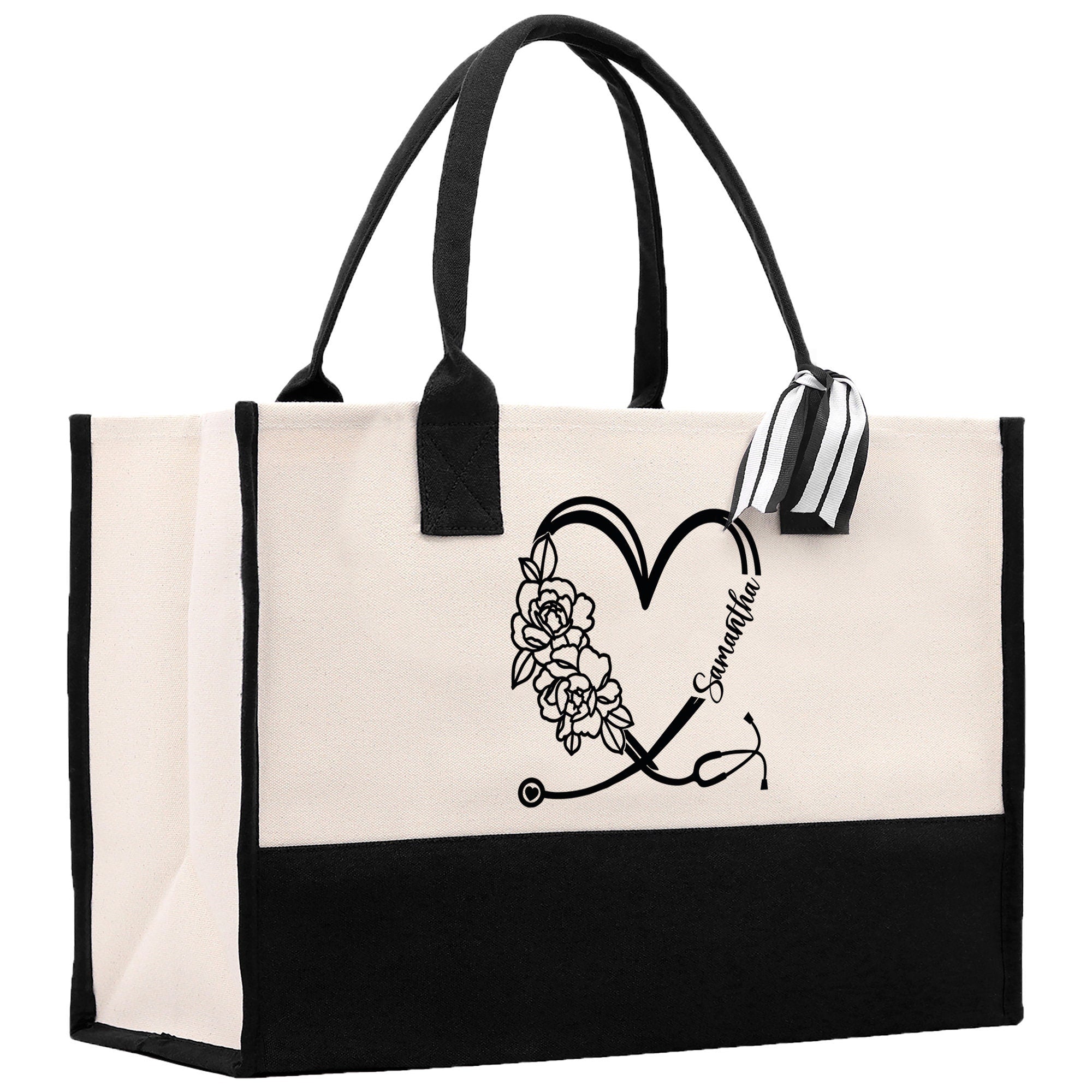 a black and white bag with a heart and flowers on it