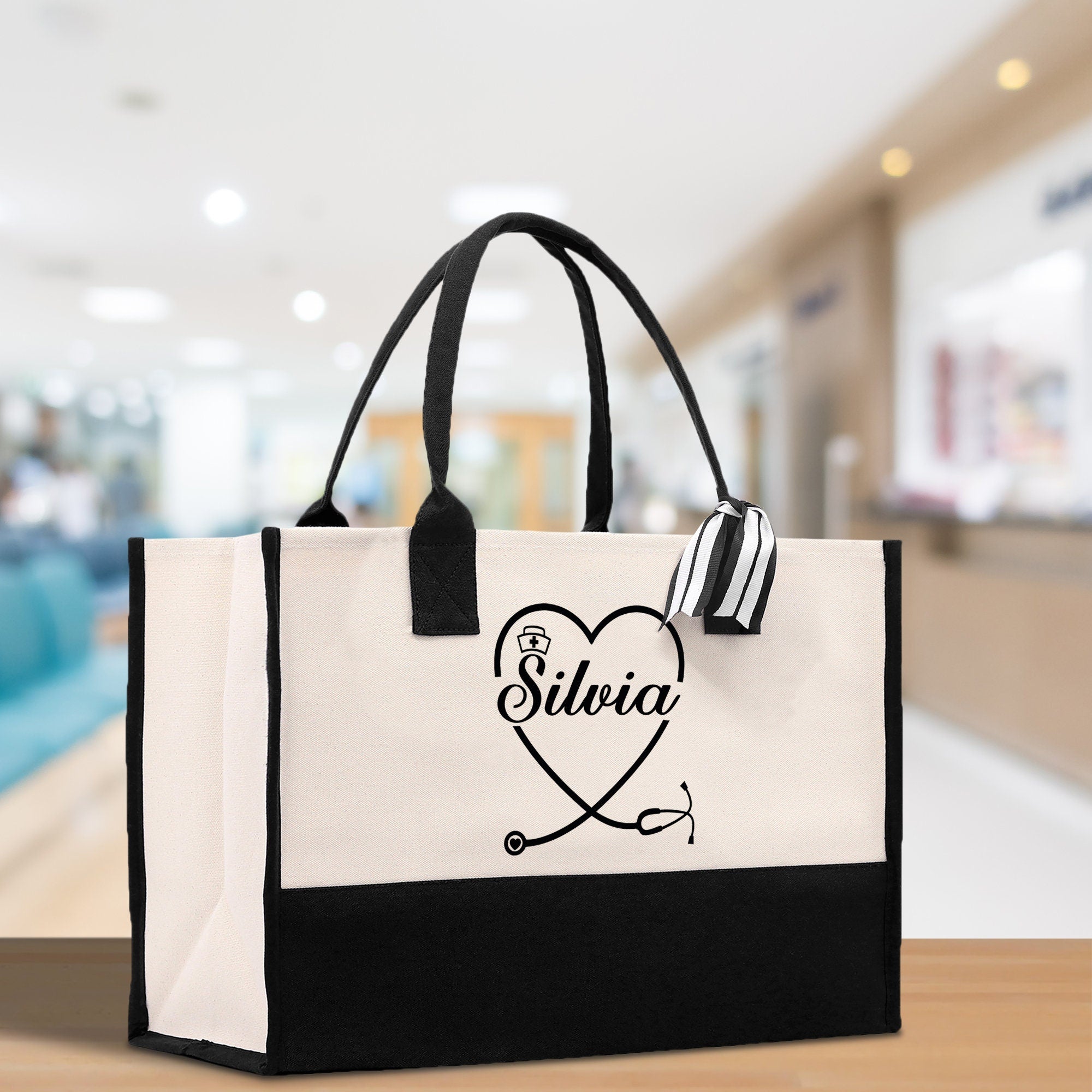 a white and black shopping bag sitting on a table