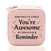 a pink lunch box with a message on it