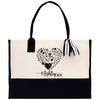 a black and white bag with a heart on it