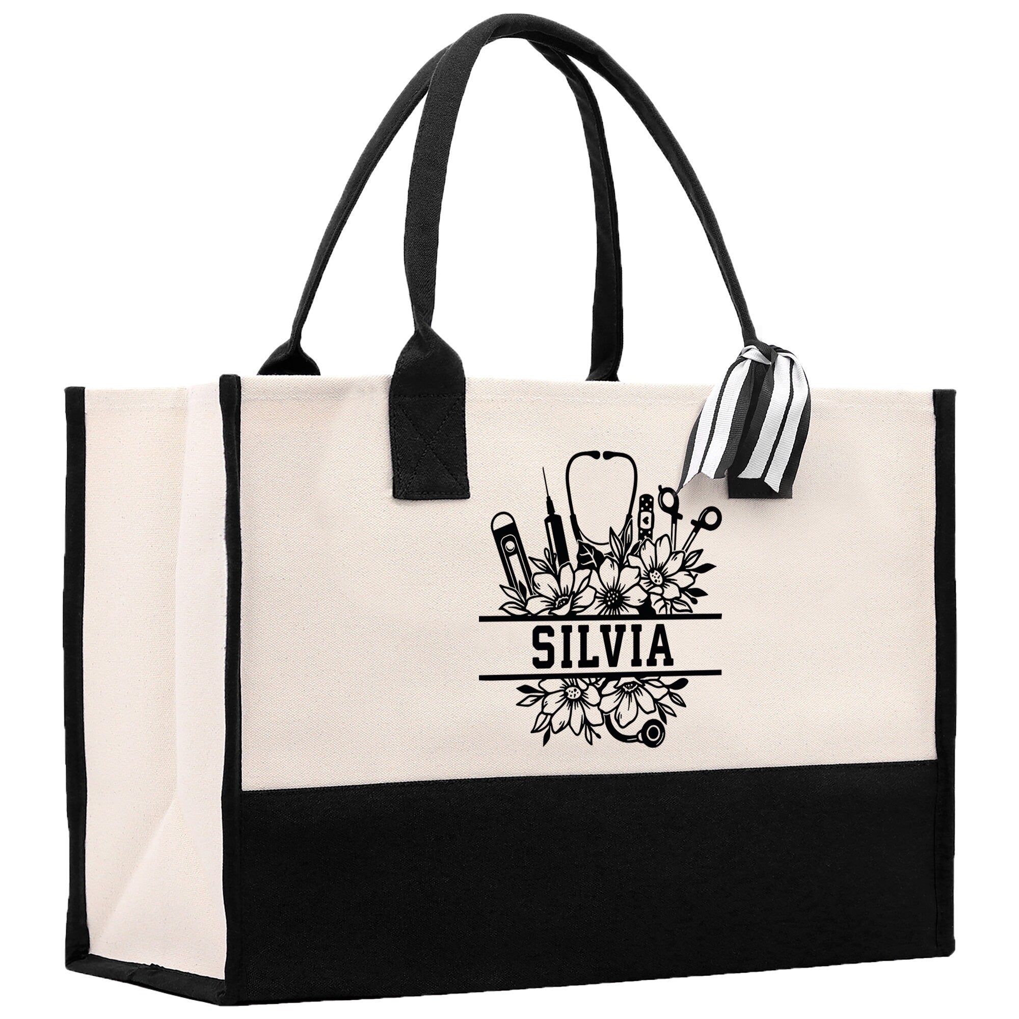 a black and white shopping bag with scissors and scissors
