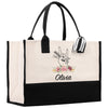 a black and white bag with a rabbit on it