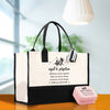 a black and white shopping bag and a pink soap