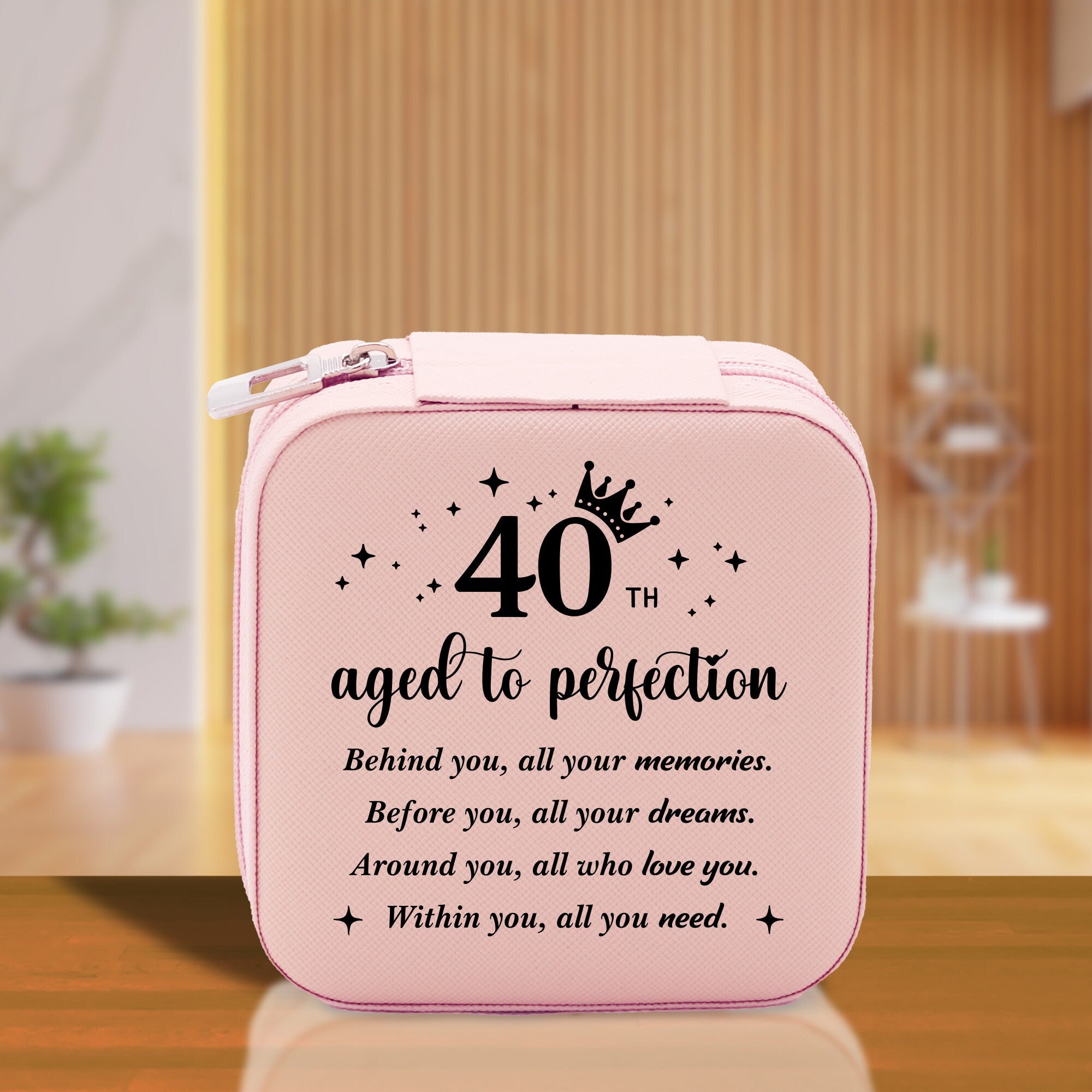 a pink lunch box with a quote on it