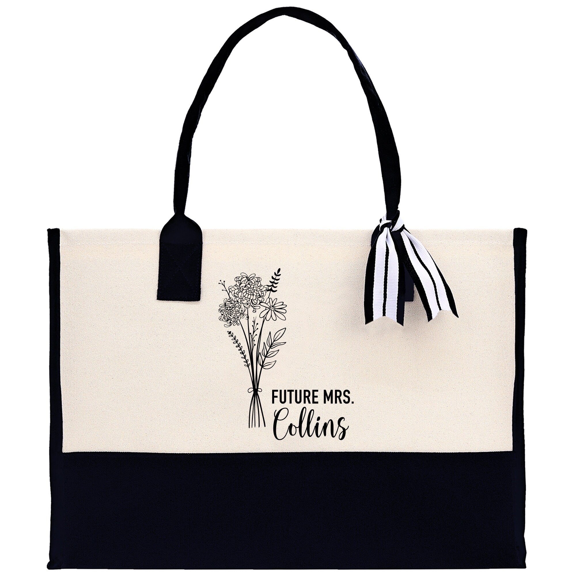 a black and white bag with a flower on it