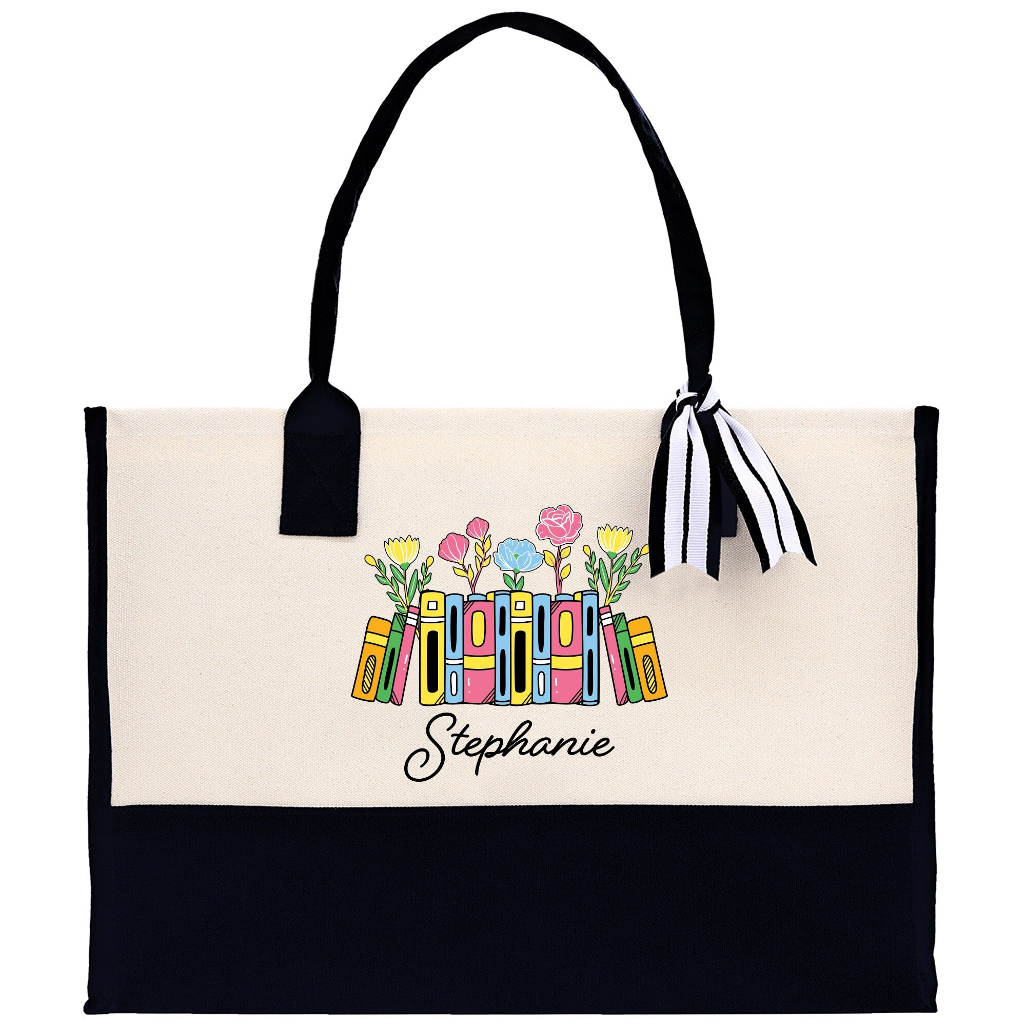 a black and white tote bag with flowers on it