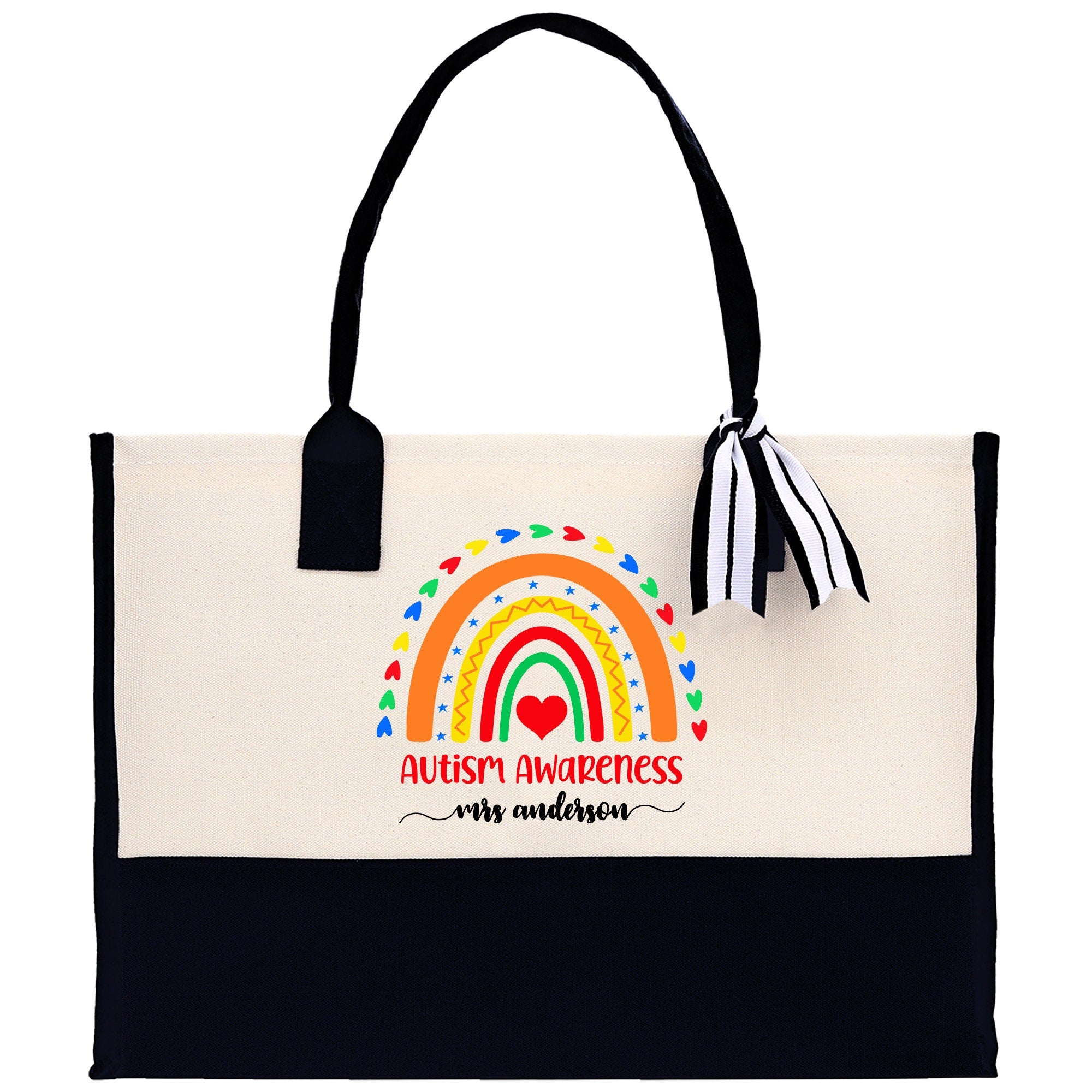 a black and white bag with a rainbow on it