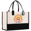 a black and white bag with a rainbow on it