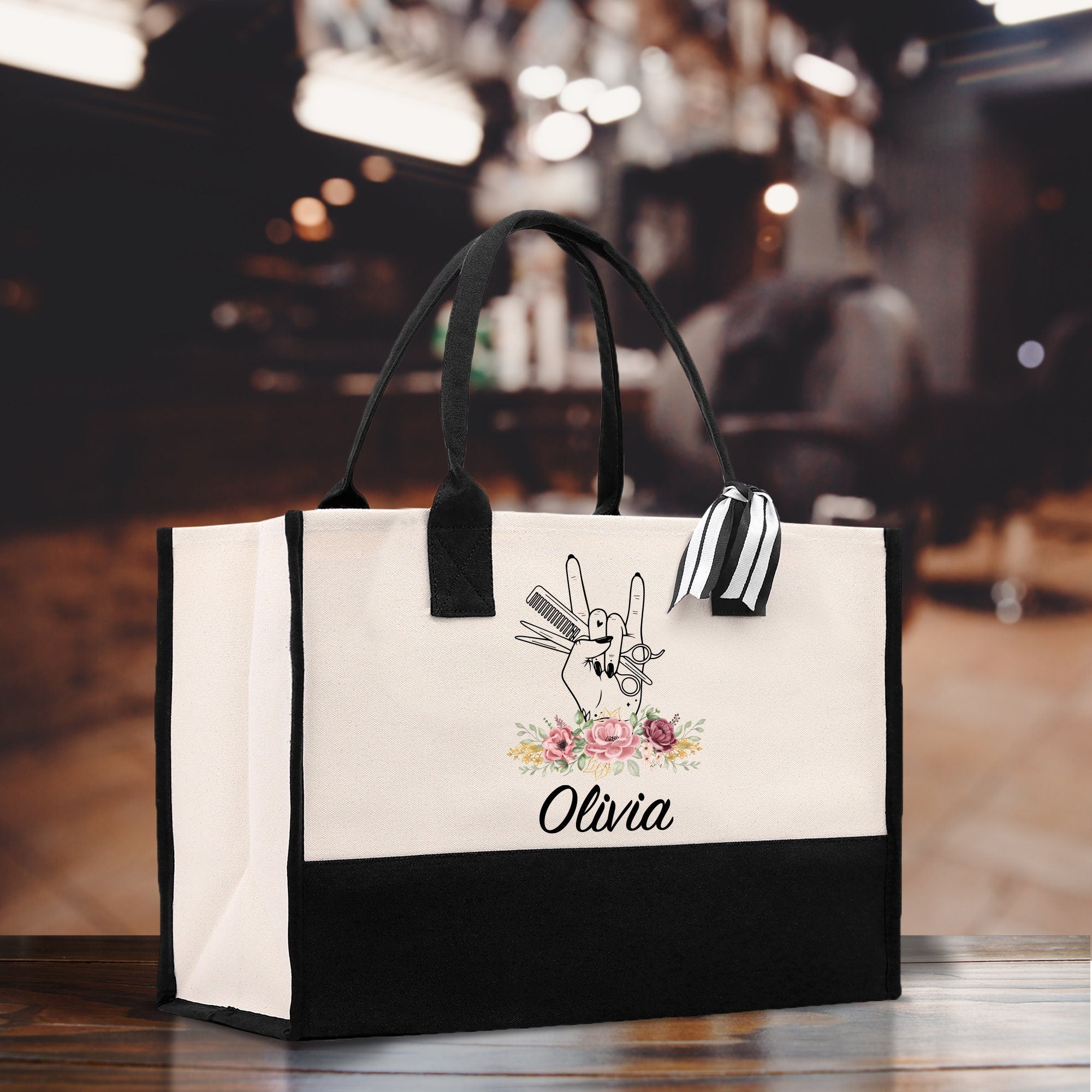 a white and black bag with a rabbit on it