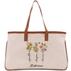 a white canvas bag with flowers on it