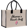 a white bag with black handles that says sharon's beach stuff