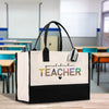 a teacher bag sitting on a table in a classroom