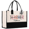 a black and white bag with a teacher on it