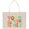 a tote bag with the words you're mom outside