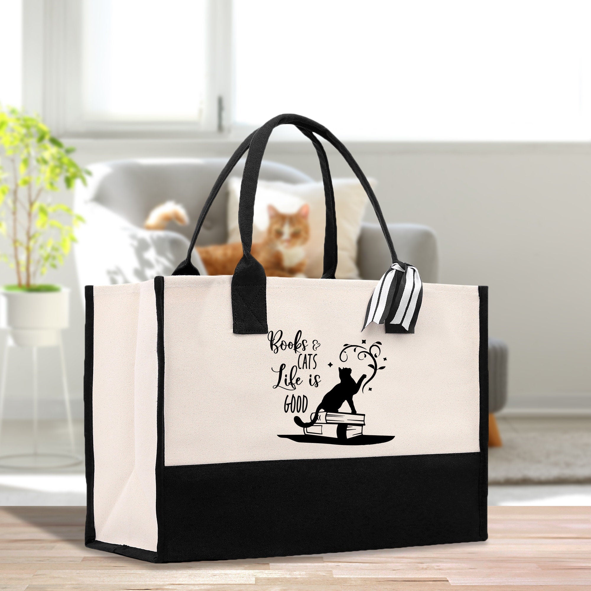 a black and white bag sitting on top of a wooden table