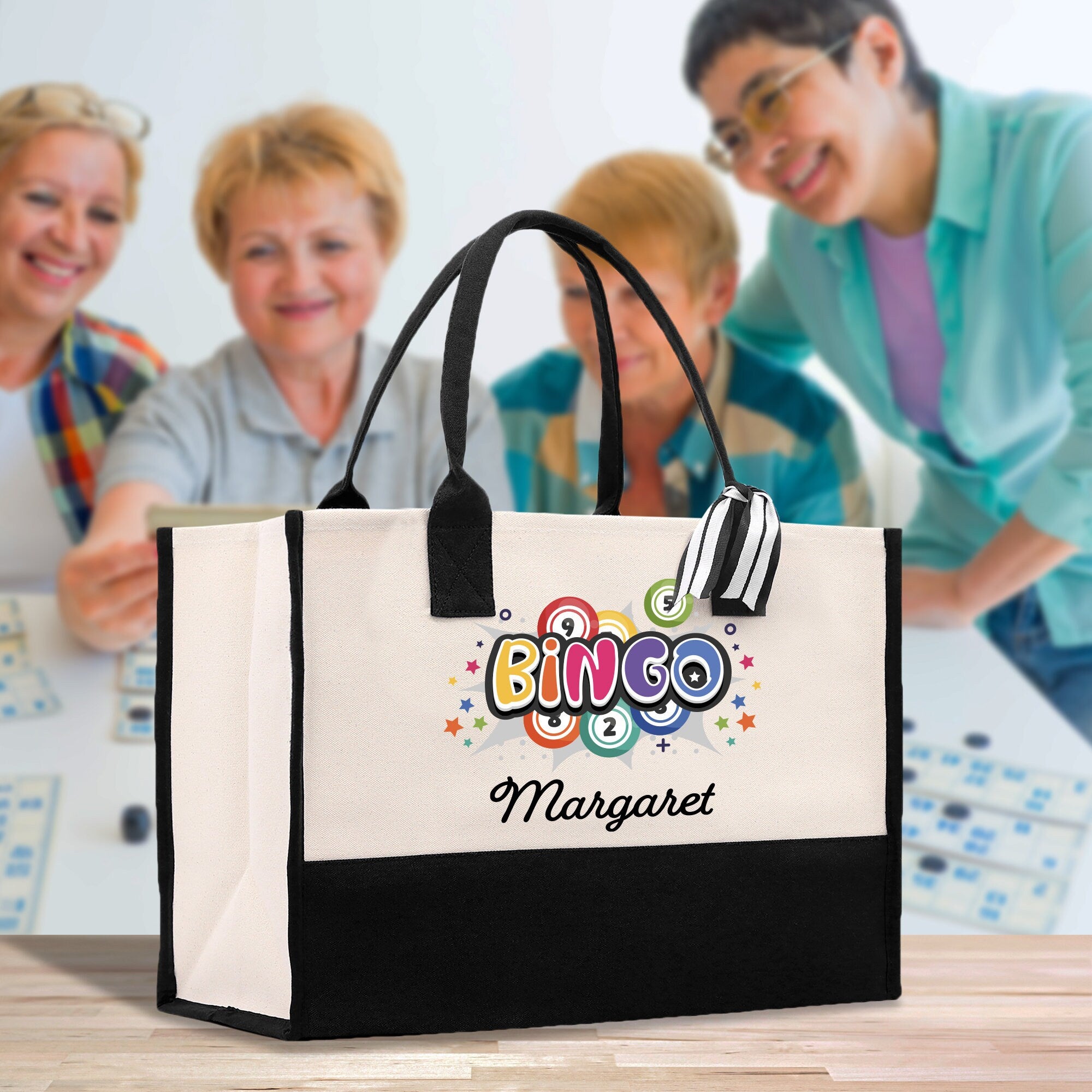 a group of people standing around a table with a bag