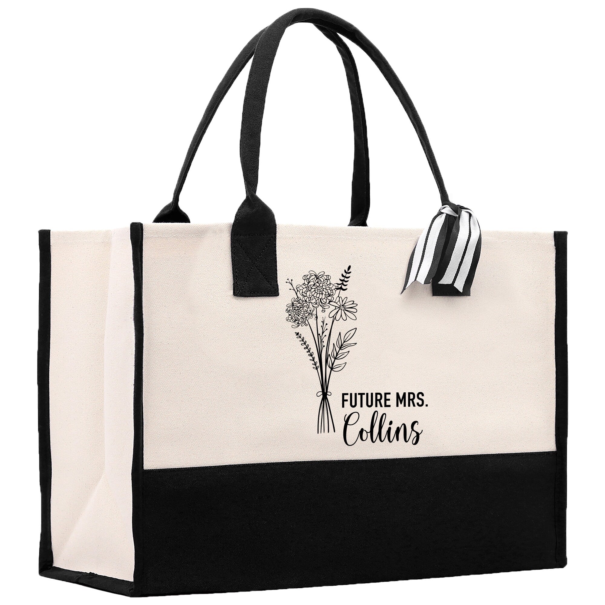 a black and white bag with a flower on it