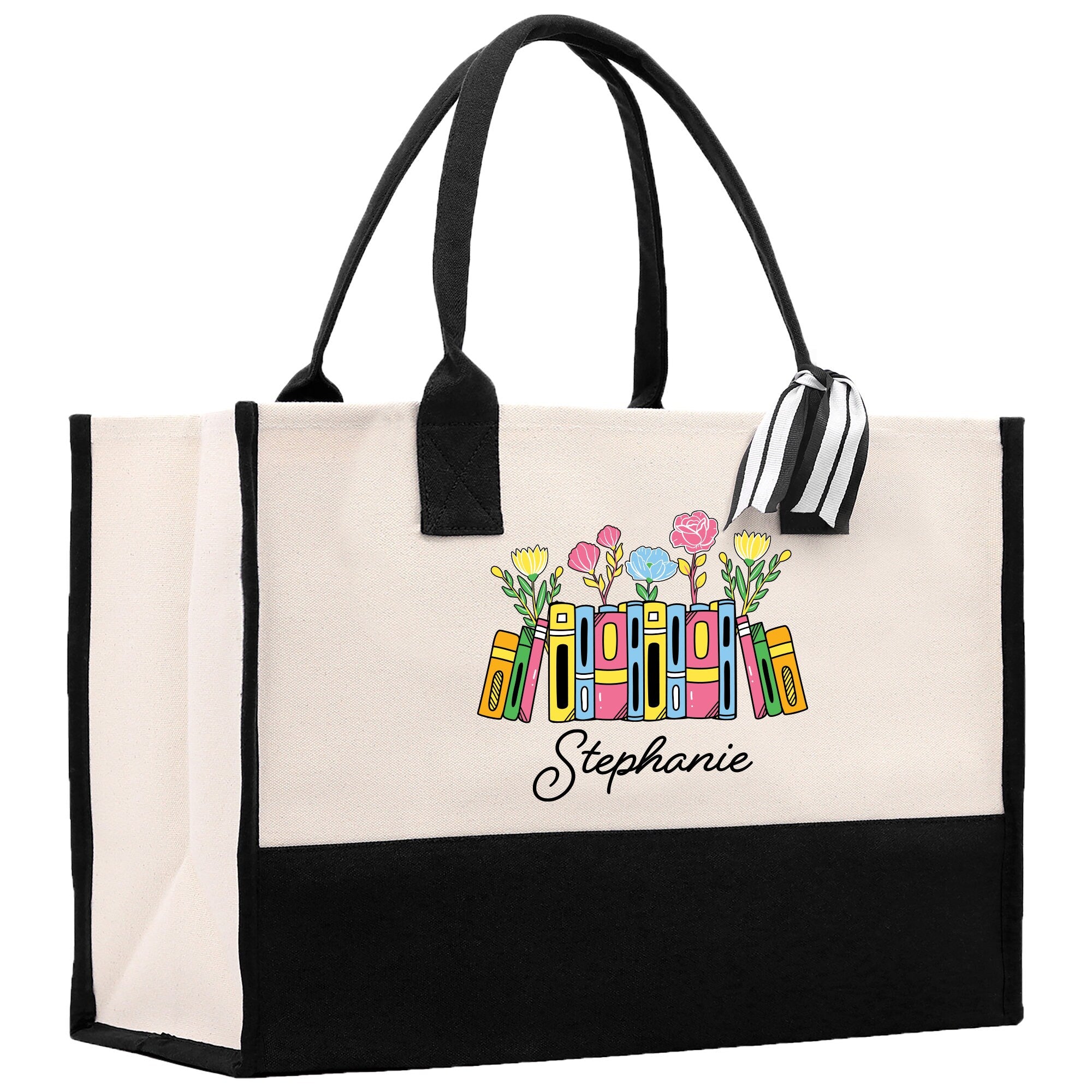 a black and white shopping bag with flowers on it