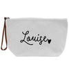 a white canvas bag with the word louise printed on it