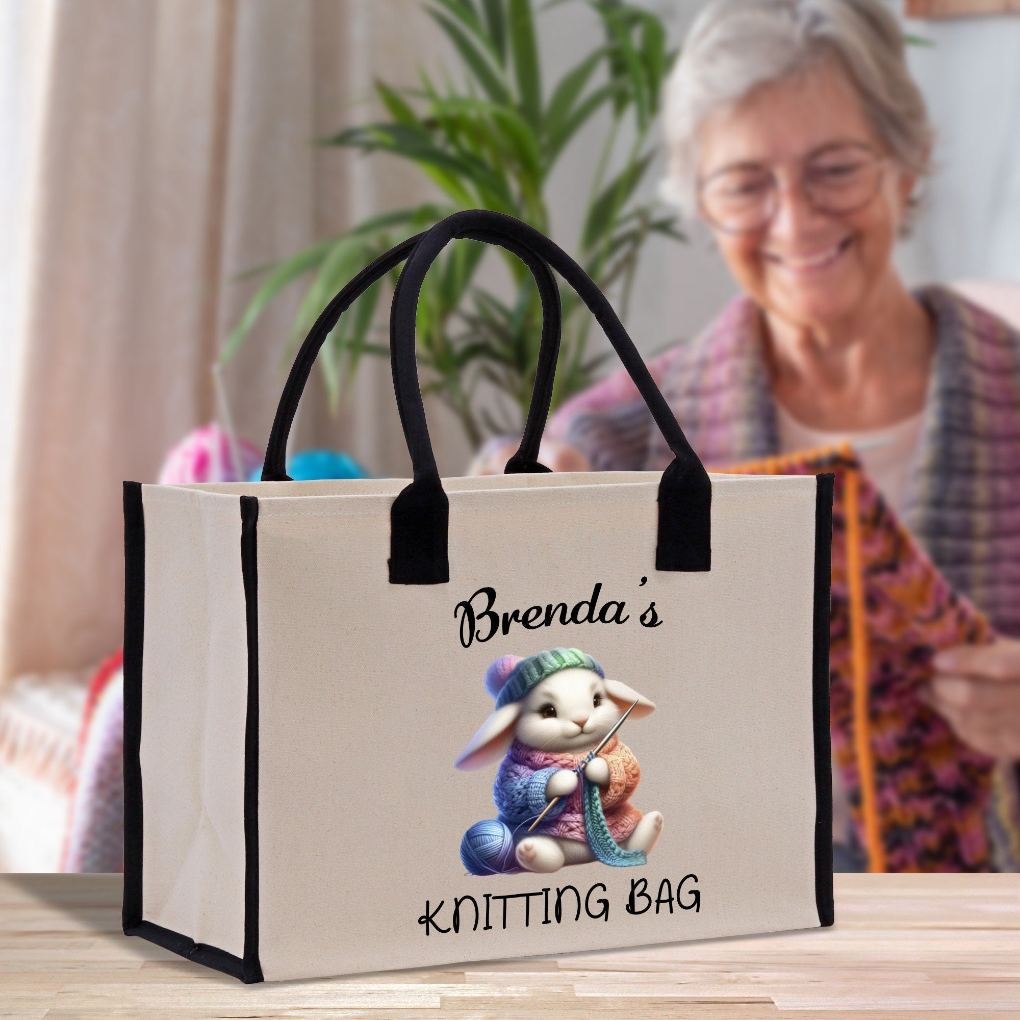 a woman sitting at a table with a shopping bag