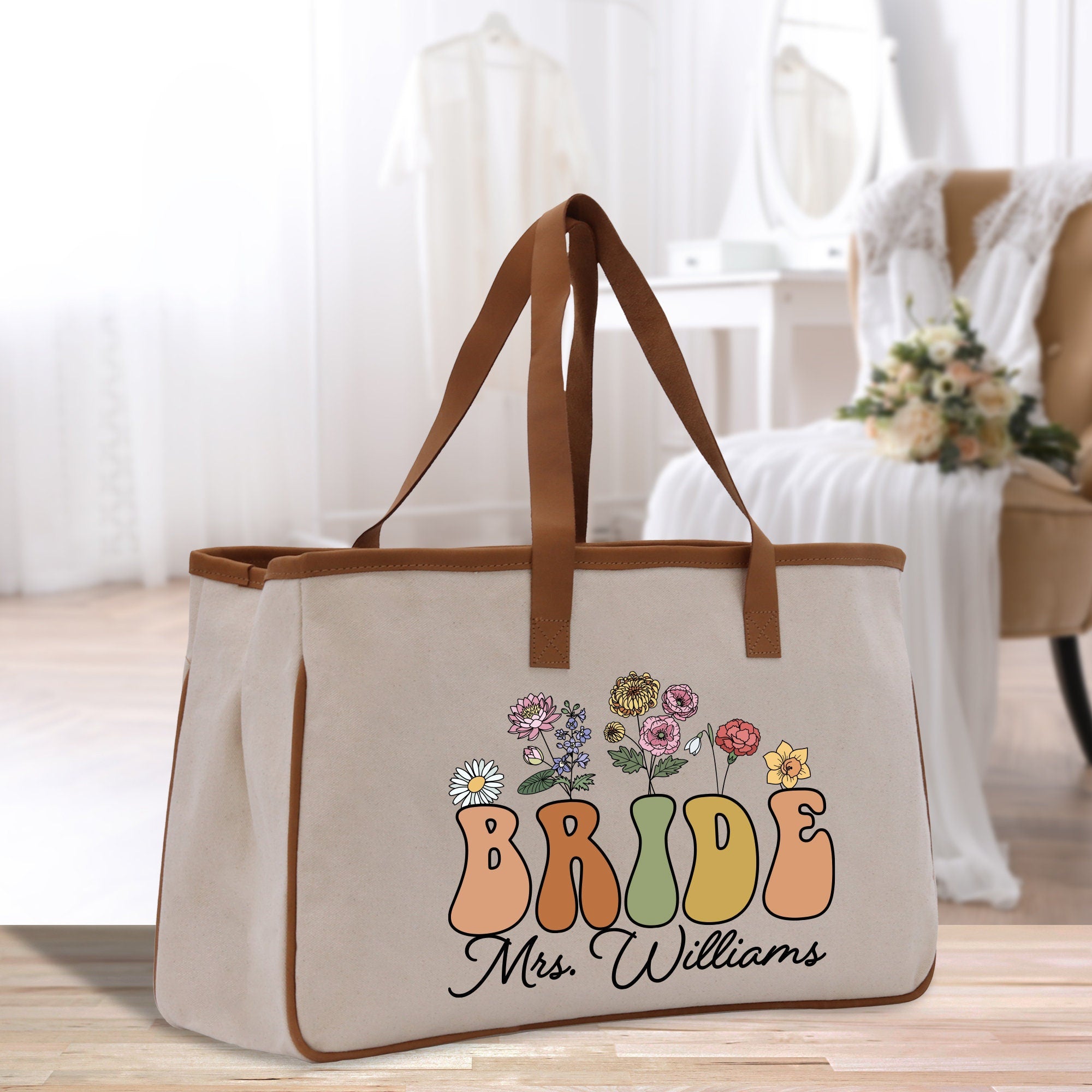 a canvas tote bag with a bride&#39;s name on it