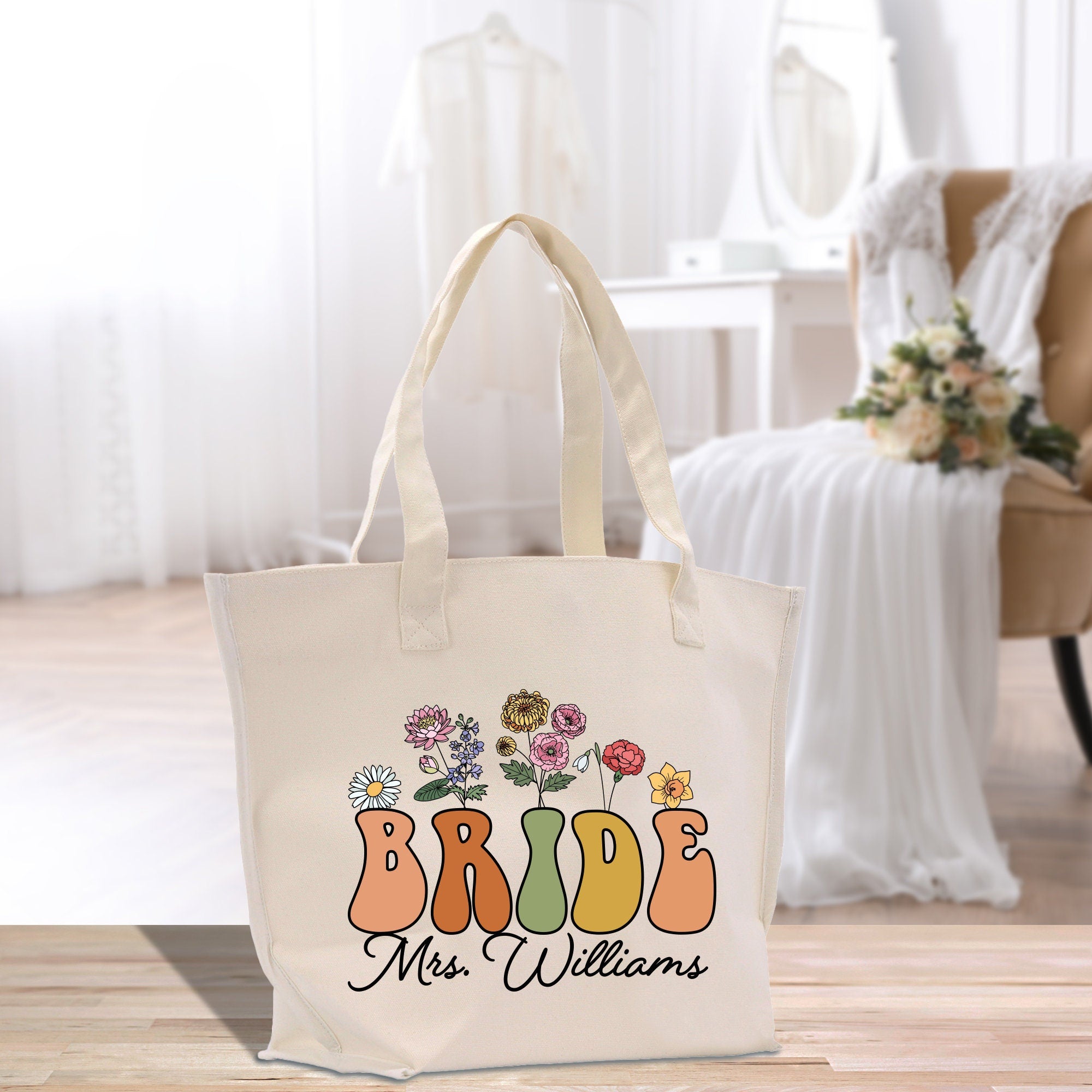 a bride&#39;s tote bag sitting on a table