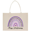 a tote bag with a rainbow and words on it