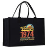a black shopping bag with the words vintage 1974 printed on it