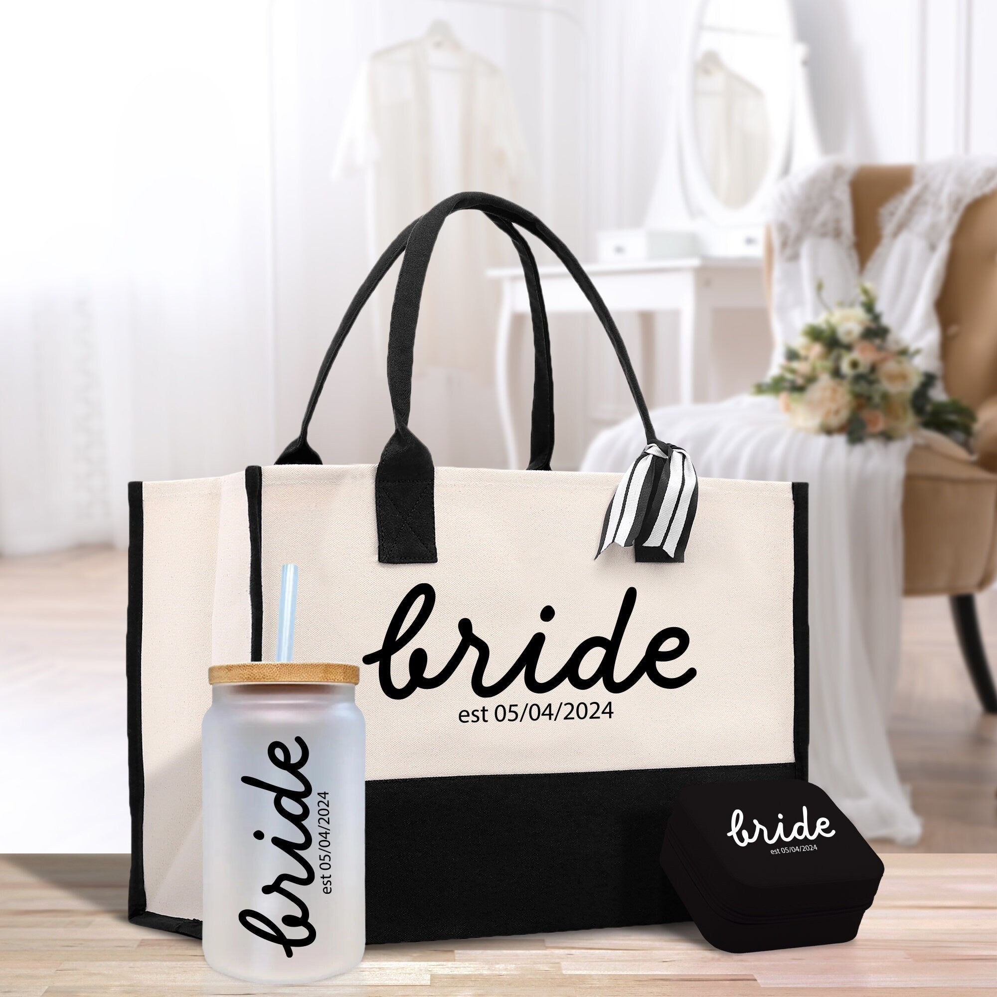 a bride bag and a bride&#39;s tote bag sitting on a table