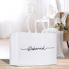 a white shopping bag with the word depporah written on it