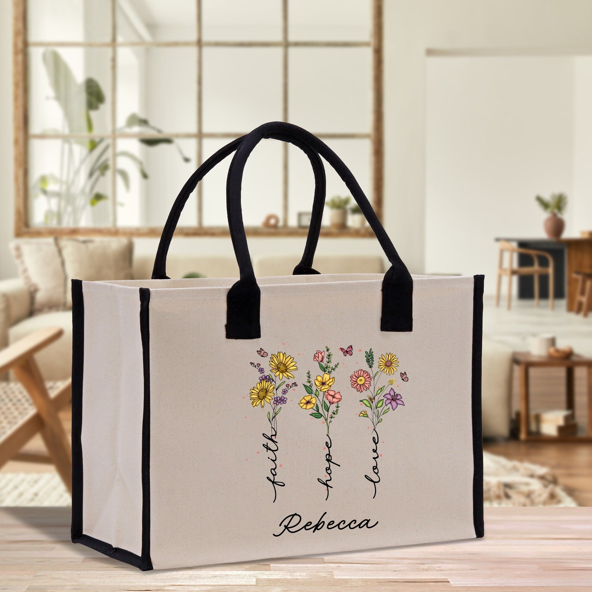 a white bag with flowers on it sitting on a table