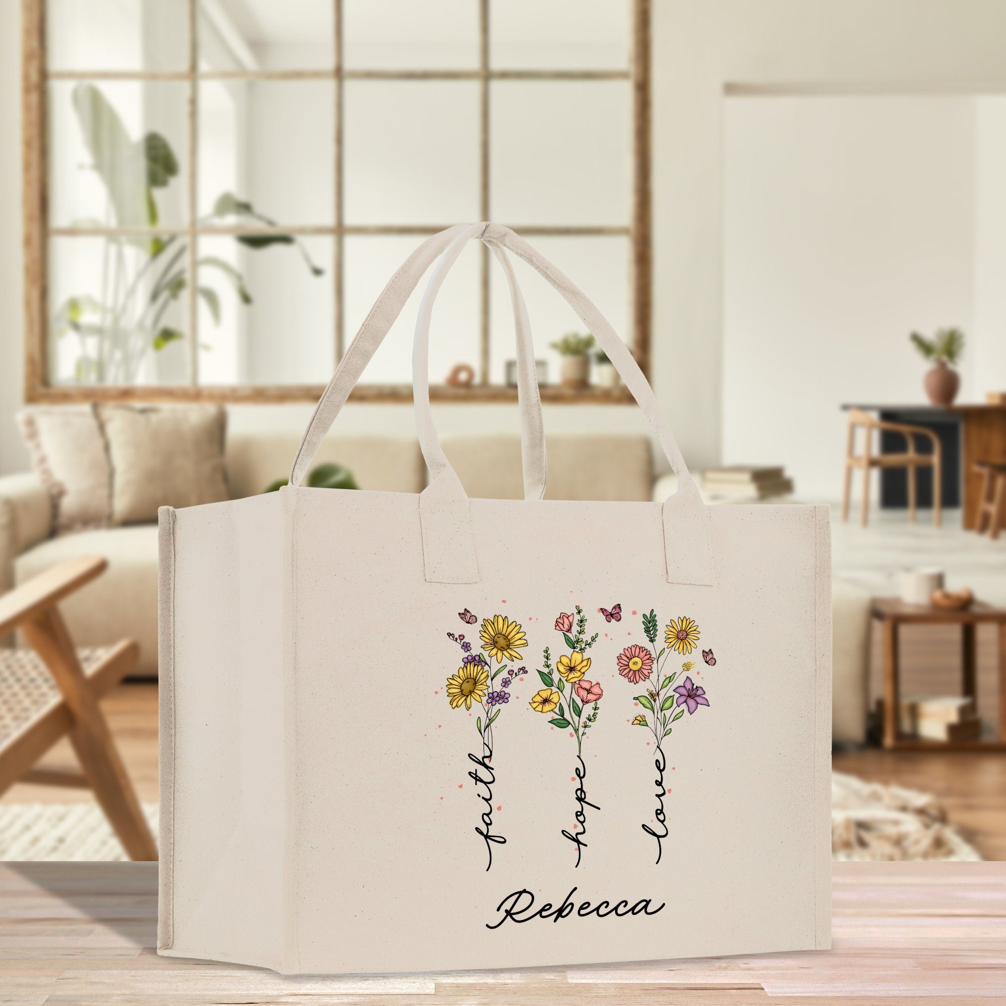 a white shopping bag with flowers painted on it