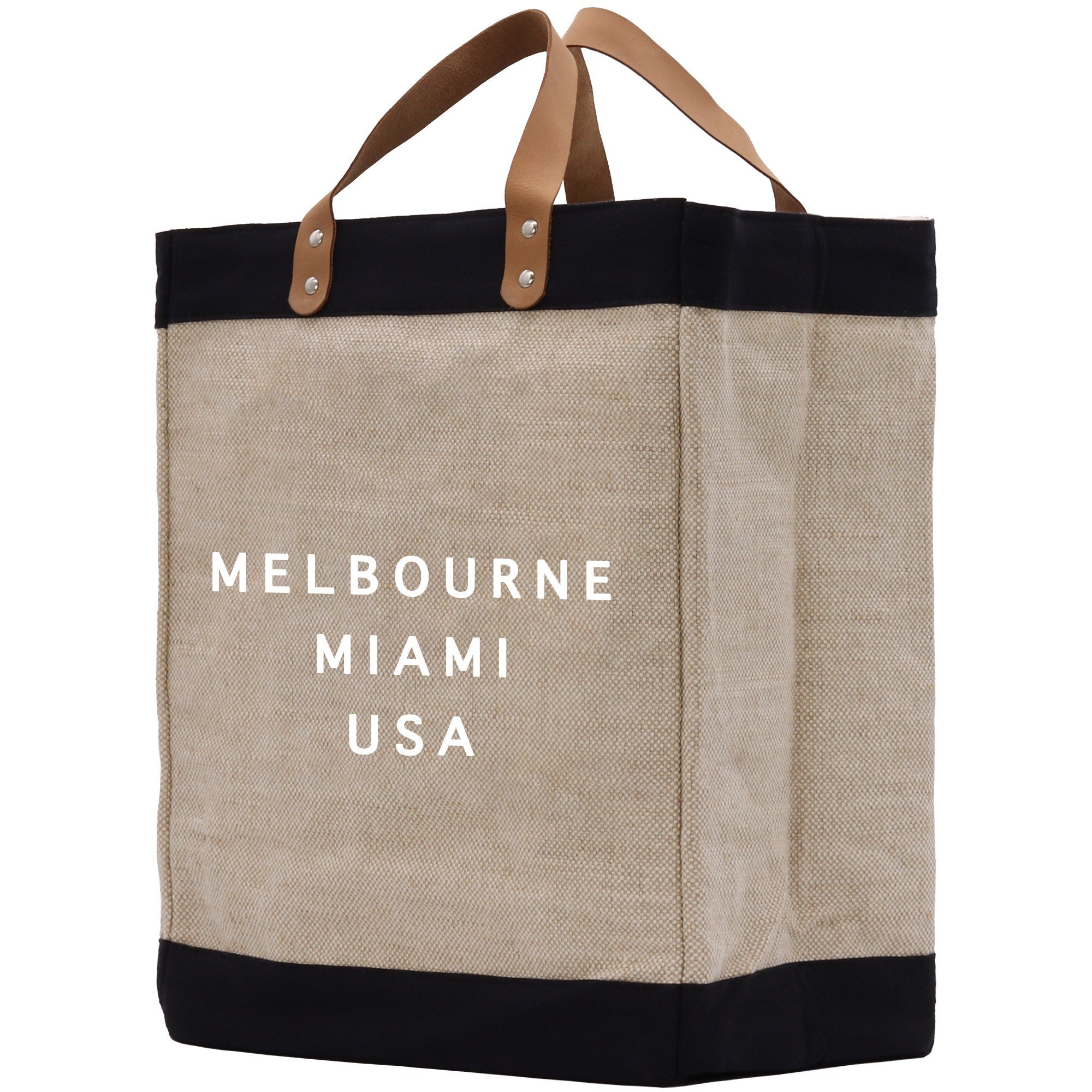 a jute bag with a black bottom and white lettering