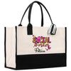 a black and white shopping bag with a floral design